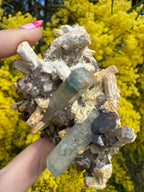 Aquamarine with Feldspar, Fluorite and Quartz on Matrix