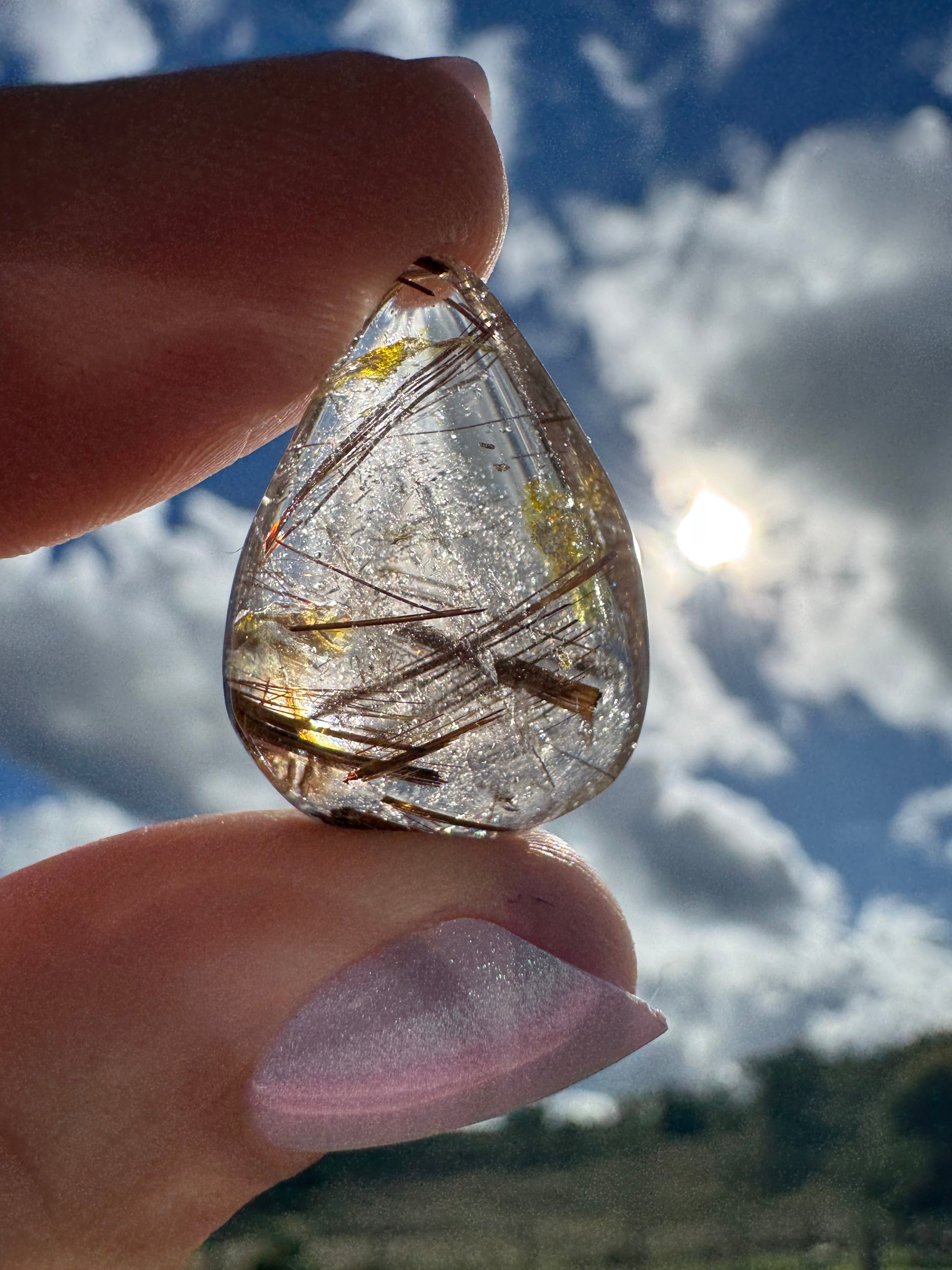 Golden Rutile In Quartz Cabachon